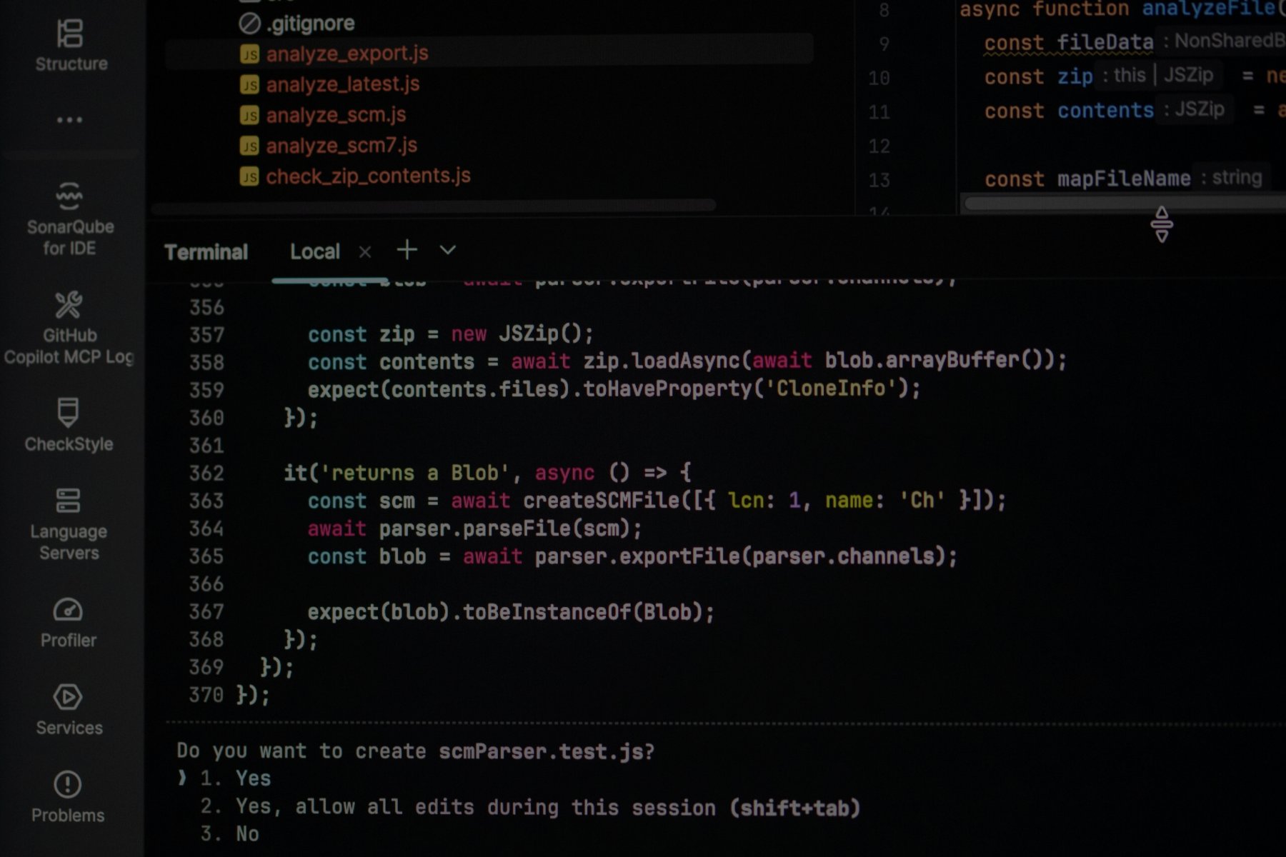 A code editor and terminal on a dark screen, dimmed, showing a JavaScript test file.